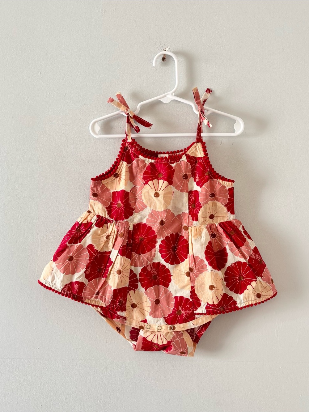 Kate Quinn NWT Spaghetti Tie Ballerina Pom Pom Bubble One Piece Floral Print